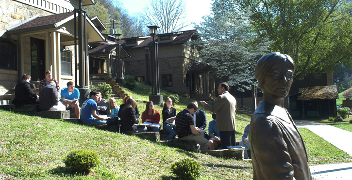ALC Values Teacher engaging students in an outdoor class session