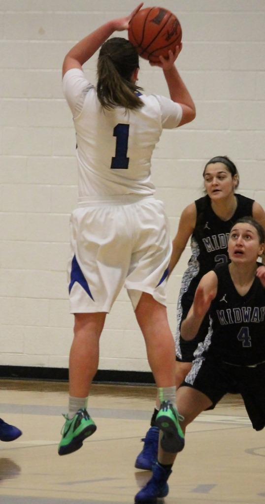 Booth elevates for the jump shot.