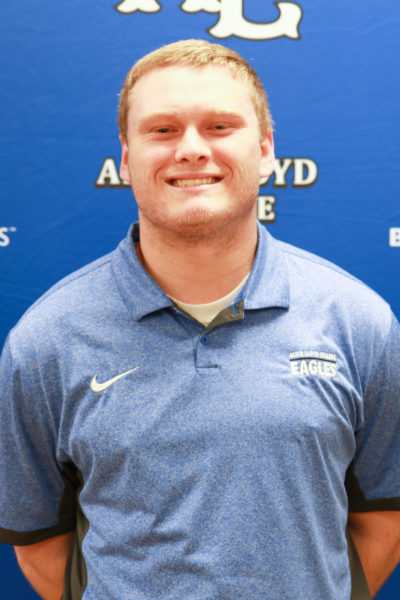 Student assistant Mason Schroeder